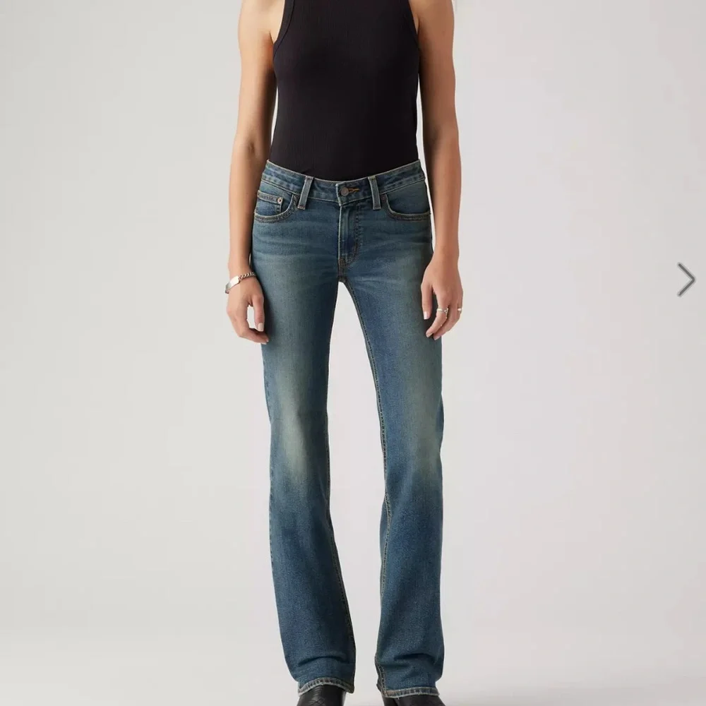 Levi's Women's Superlow Bootcut Jeans 23 - Picture 2 of 6